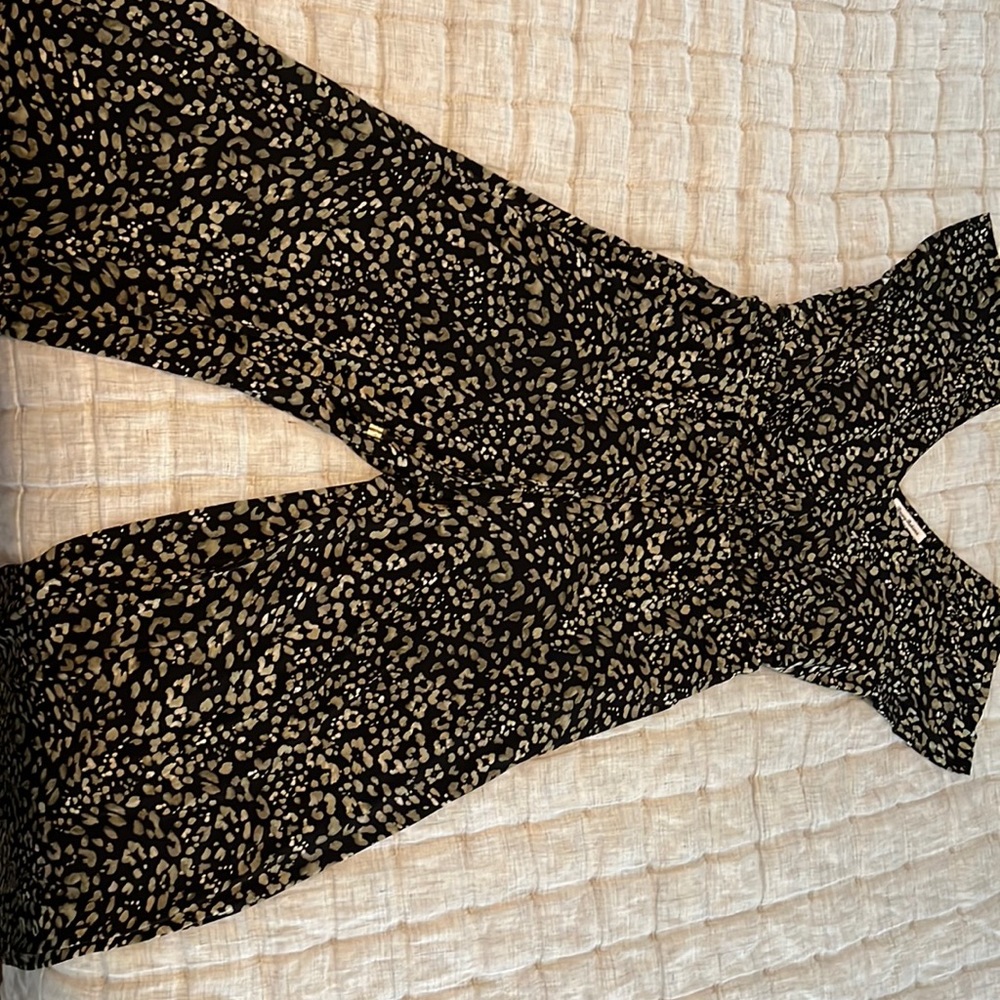 Tommy Bahama jumpsuit.  Green and black print.  Size large.